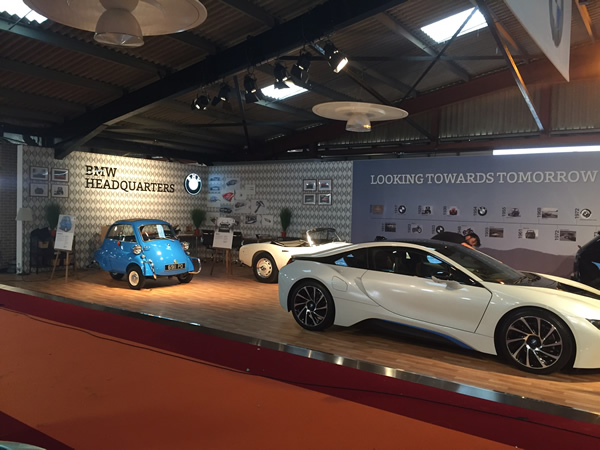 BMW is going back to the future for its stand at this weekend’s Goodwood Revival historic motor race meeting. As the whole theme of the Goodwood Revival event celebrates motor racing during the 20 years immediately after the end of the SWecond World War – up to 1966 – BMW’s stand features a retro 1950s prediction of what the future (today) might look like.