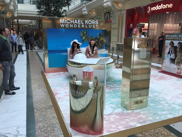 Blackjack Promotions, a leader in retail-focused experiential marketing, has delivered a complete package for the launch activity of Michael Kors’ new perfume, Wonderlust, in Manchester’s Trafford Centre, with the activation culminating at Birmingham’s Bull Ring today (October 4, 2016). Working from an initial brief and a 30’ TV ad, Blackjack developed the creative, designed the stand, created a social sharing mechanism, recruited and provided brand ambassadors, as well as full build and installation.