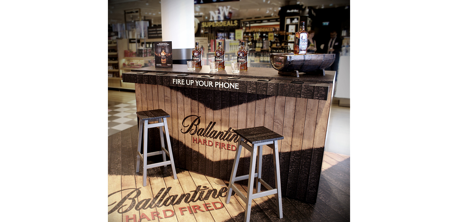 Ballantine's Hard Fired whisky variant – matured in charred American oak barrels – has introduced multisensory charred bars to Paris airports to highlight the bespoke distillation process. The Ballantine’s Hard Fired multisensory bar will be a new engagement launching in the travel retail environment, giving passengers the opportunity to ‘fire up’ their journey with a taste of whisky while sitting at a bespoke charred bar, smelling hints of wood smoke and vanilla.