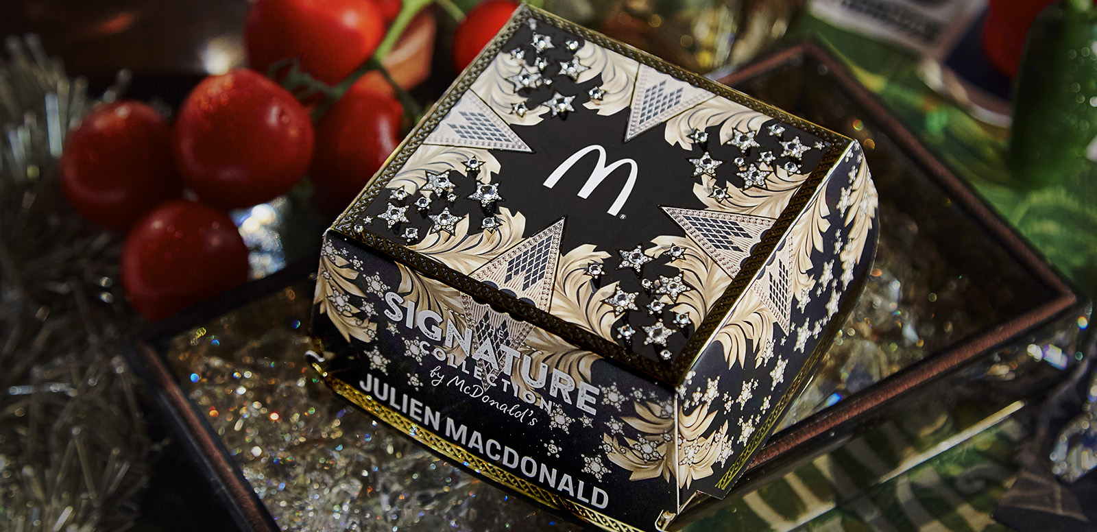 McDonalds UK has partnered with fashion industry icon, Julien Macdonald OBE, to unveil his interpretation of a deluxe burger box for McDonald’s Signature Collection, its range of gourmet burgers.