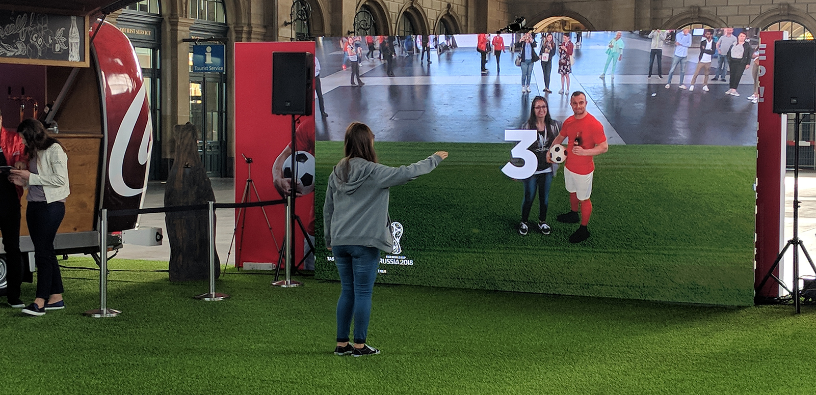 London-based specialist Digital Out of Home (DOOH) agency Grand Visual has been brought in by Coca-Cola in Switzerland to run a large-format Augmented Reality (AR) experience at Zürich’s main train station to celebrate the FIFA World Cup and the soft drinks brand’s continued support of the game. Lucky fans are being offered the chance to engage with a digital version of Switzerland's Xherdan Shaqiri on-screen.