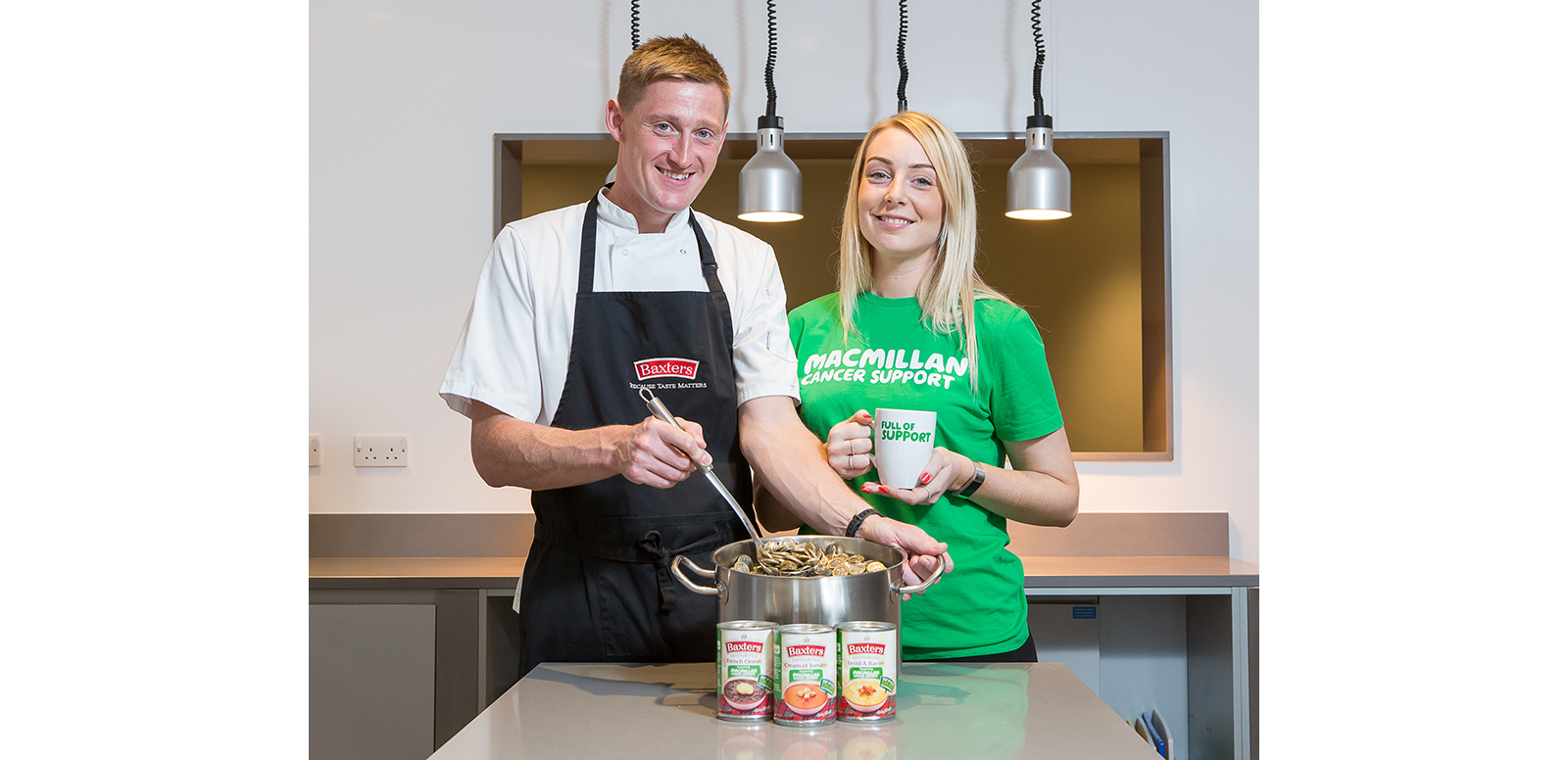 Laura Foreman Fundraising Manager for Macmillan joins Baxters Chef and Group Innovation Manager Darren Sivewright to serve up funds for Macmillan